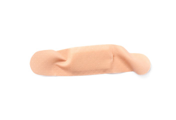 Used sticking plaster isolated on white, top view. First aid item