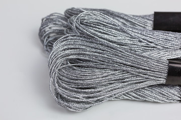 skeins of silver embroidery threads