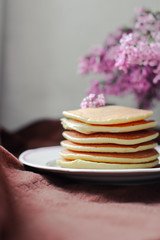 tasty pancakes on a brown white background