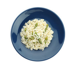 Delicious risotto with asparagus isolated on white, top view