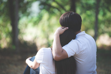 Portrait of young asian couple in love  in the forest,Thailand people happy to be together,Valentine day concept