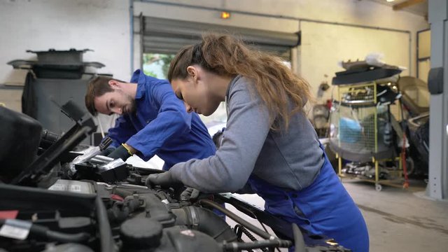 Young people in car industry training 