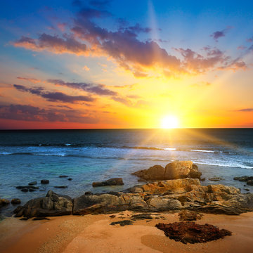 Beach of the sea and beautiful sunrise. © alinamd