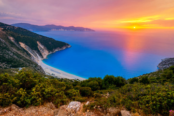 Beautiful summer sunset on Mirtos beach in Greece © Piotr Krzeslak