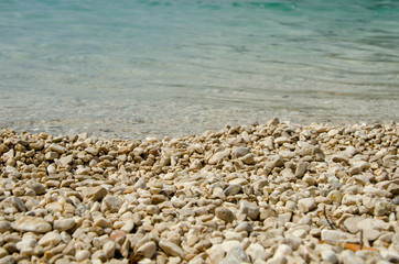Stony beach - Stone and water in macro photo