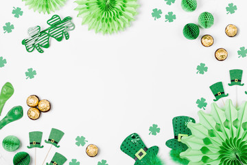 Decorations and props for St.Patrick 's Day party. Green and gold paper decorations, hat, balloons,...