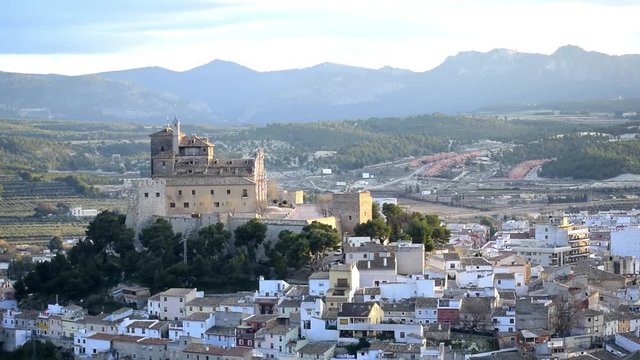Time lapse of Caravaca De La Cruz cityscape and castle, Pilgrimage site near Murcia, in Spain. One of the 5 holy cities in the world.
