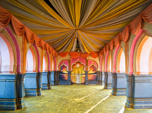 Indian hindu wedding mandap, decorations and interiors. Mandap setup in Hindu temple
