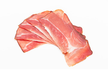 Hamon sliced on white background. Spanisch traditional meat.