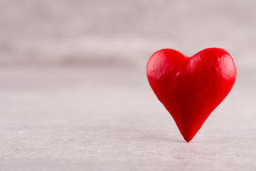 Fototapeta premium Red hearts on grey background. Valentines daz greeting cards.
