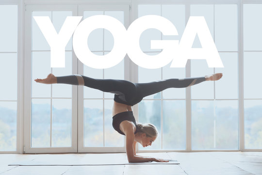 Sporty woman balancing on elbows with splitted legs, yoga lettering