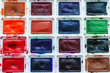 watercolor paints on a white background. Art workshop, art school.