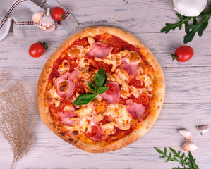 pizza with tomato and basil