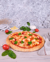 pizza with tomatoes and cheese