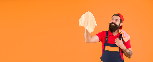 man clean house. housekeeping business. call cleaning service. maid household. happy hipster cleaning material in hand. copy space. bearded man hold duster microfiber for cleaning. Spring cleaning
