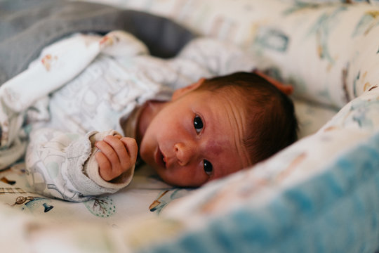 Authentic photography of a newborn with slightly lower birth weight. 