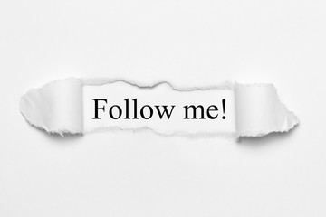 Obraz premium Follow me! on white torn paper