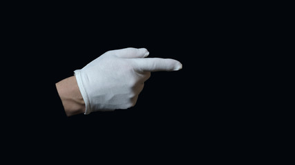 hand with white glove isolated before black background