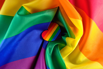 LGBT pride flag with the heart coloured in the LGBT pride colours. Concept of the Valentine day, freedom, equality