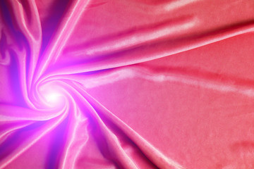 Texture, abstract background, silk red fabric artistically laid out.