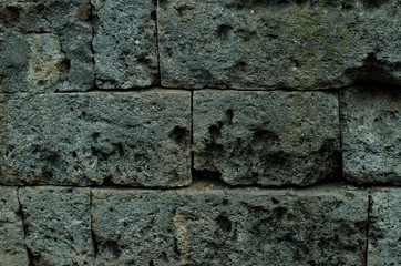 Old masonry. Stone wall. The wall of the old castle.