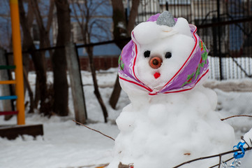 snow woman in the playground