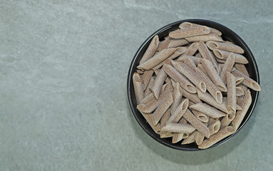 Uncooked buckwheat pasta.