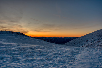 Fototapeta na wymiar Foggy morning scene of winter mountains. Unbelievable sunrise in Mala Fatra Slovakia