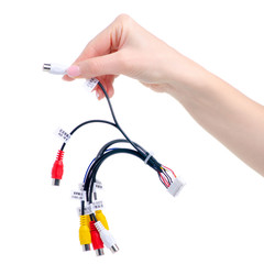 Connection cable car stereo in hand on white background isolation