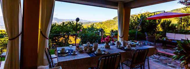 breakfast on the terrace in the italian village