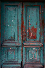 close up ancient blue and brown shabby  door