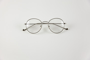 Transparent glasses on a white background