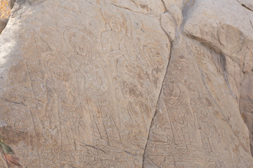 buddhist mantras carved in stone