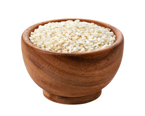 Risotto rice in wooden bowl isolated on white background