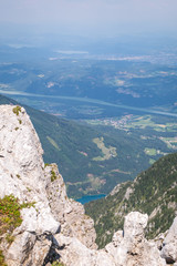 Fototapeta na wymiar View from mountain Hochobir to valley Rosental, lake Freibach Stausee