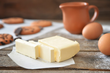 Fototapeta na wymiar Fresh butter on wooden table