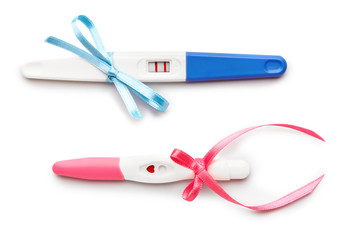 Pregnancy tests on white background