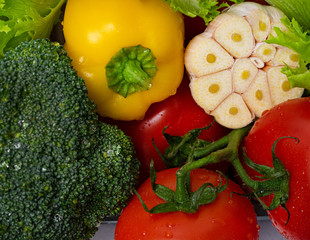 Some Fresh Vegetables. Closeup: lettuce, tomatoes, cabbage, pepper and garlic. Delicious, health.