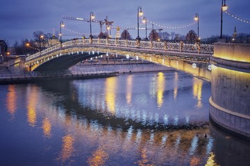 Naklejka premium elimination bridge and its reflection in the river in Moscow