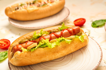 Tasty hot dogs on light table