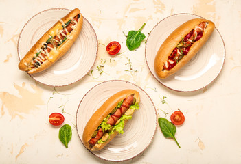 Tasty hot dogs on light table