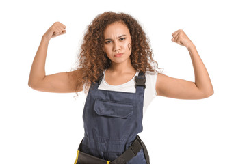 African-American female worker with symbol of woman drawn on her face against white background....