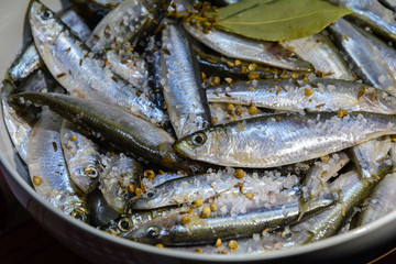 Tasty salted fish with spices. Small fish. Sea fish. Dietary nutrition.