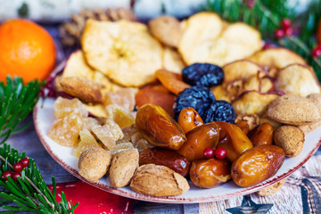 Christmas Card with Dried Fruits and Pine Branches .Christmas Background Concept with Dates