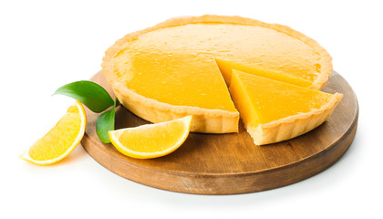 Board with tasty lemon pie on white background