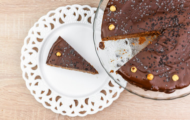 Biscuit cake with chocolate and hazelnuts