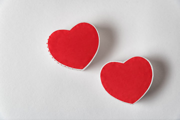 Two red heart shaped box on the white background. Copy space. Directly above. Valentine's day