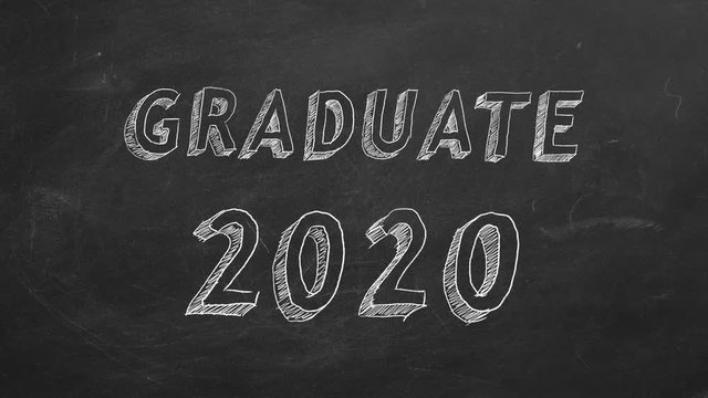 Hand drawing "Graduate 2020" on blackboard. Stop motion animation.