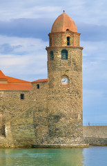 Steeple of a medieval church at the sea