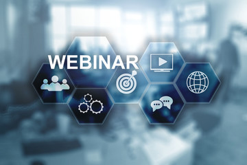Webinar on virtual screen. Inscription on blurred office background.